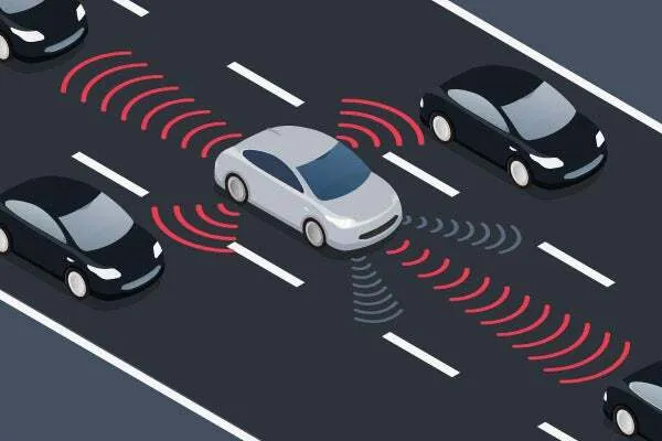 Digital image of 4 cars on a freeway, the center car has illustrates sensors reaching out in multiple directions.